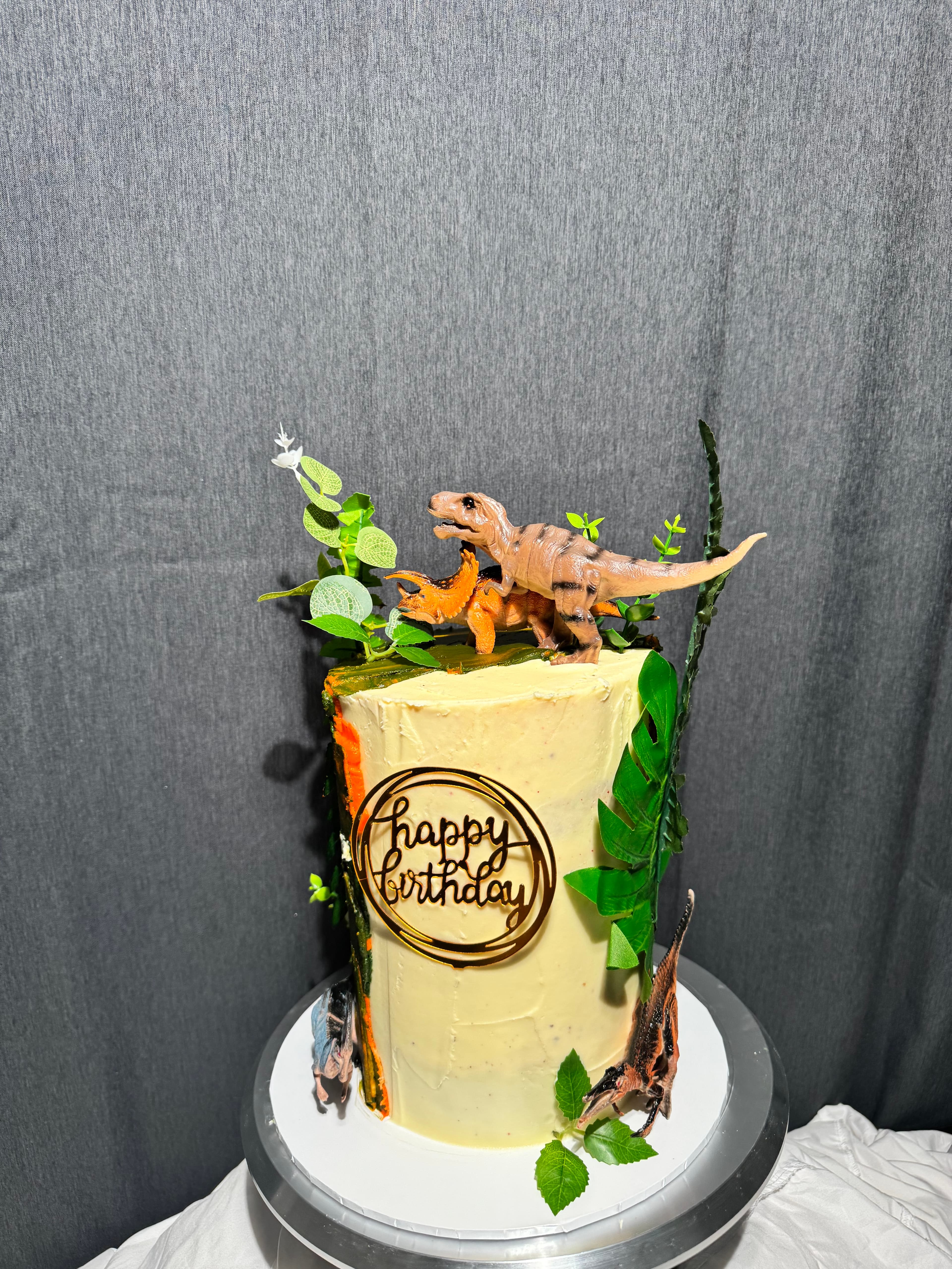 Dinosaur themed birthday cake