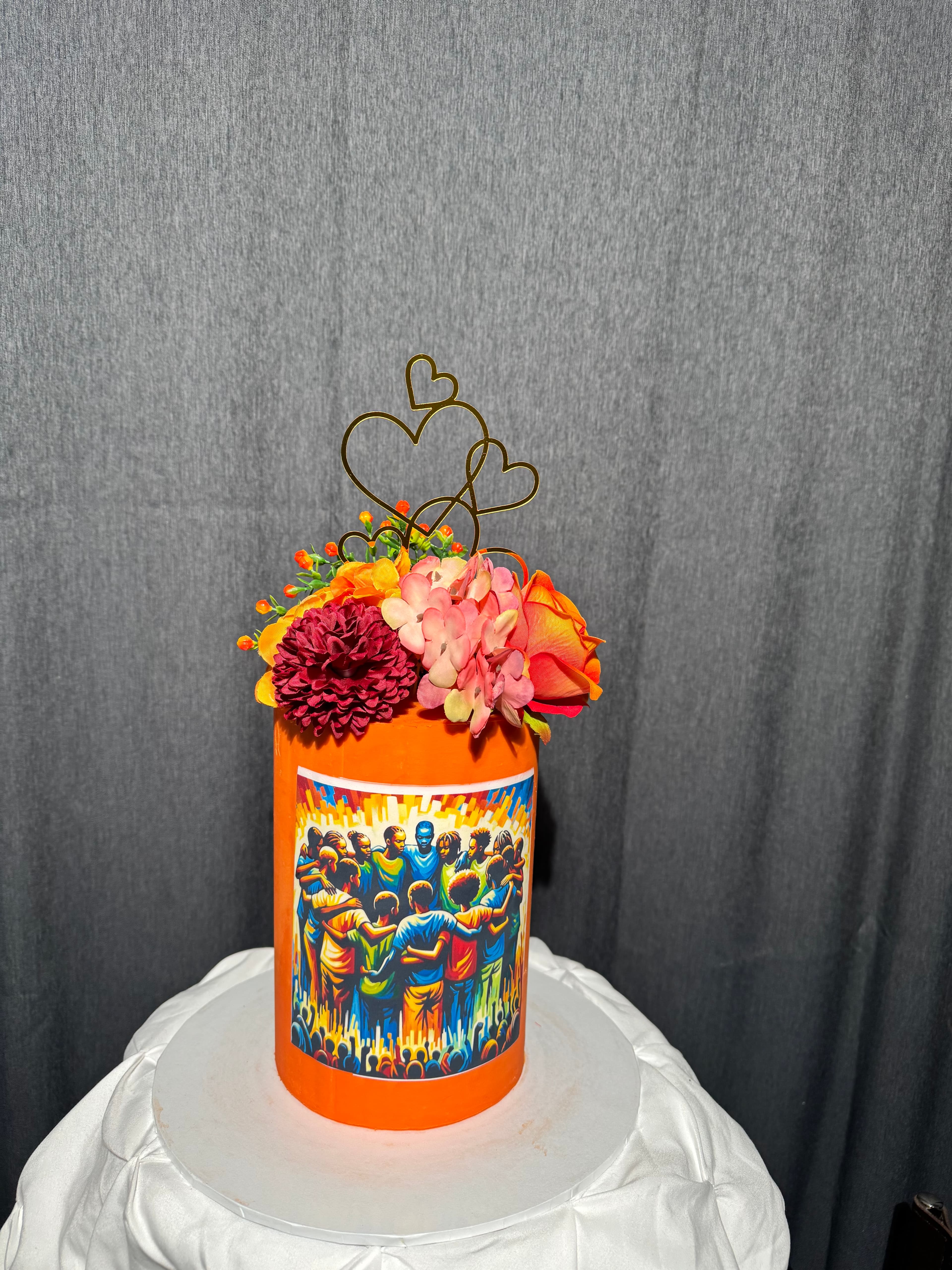 Orange celebration cake with flowers