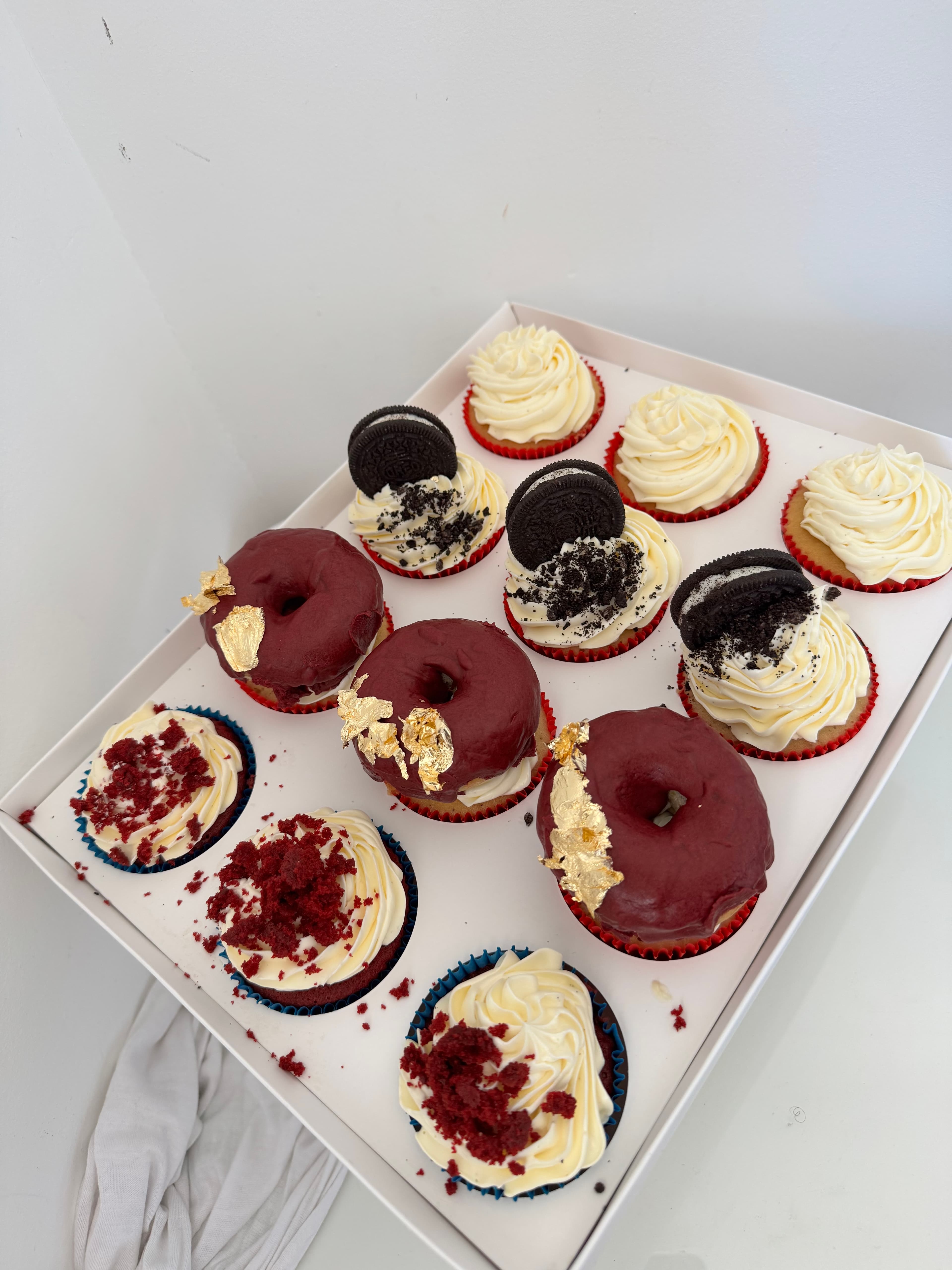 Box of cupcakes and doughnuts